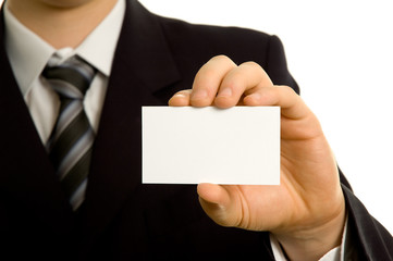 Businessman showing a blank business card
