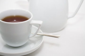 Cup of tea and teapot