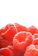 Ripe raspberries isolated on white background