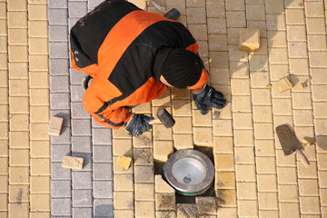 Road worker making pavement