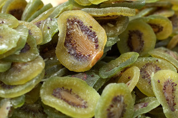 heap of dried kiwis slightly covered with sugar