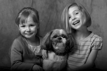 Fototapeta na wymiar children and their dog
