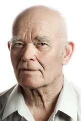 Confident looking elderly man. Isolated on white background