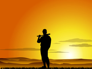 Baseball player at sunset