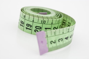 Measuring tape on white background.