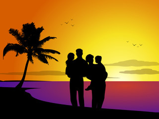 Family at sunset on a tropical beach