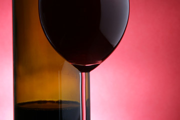 Glass and bottle of red wine