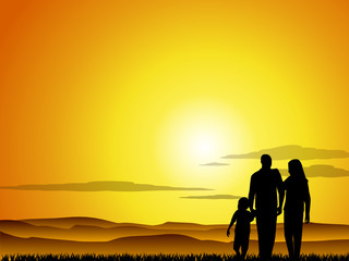Fototapeta na wymiar Family at sunset