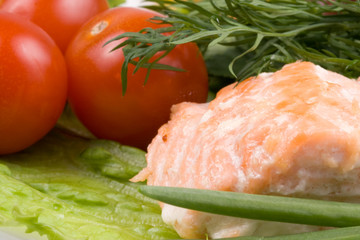 Stake from a salmon with vegetables