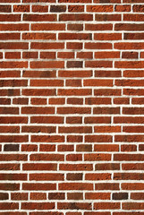 Red brick wall close up background.