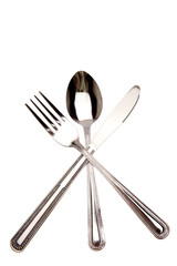 Knife, fork and spoon isolated on white
