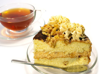 Cup of tea and cake isolated