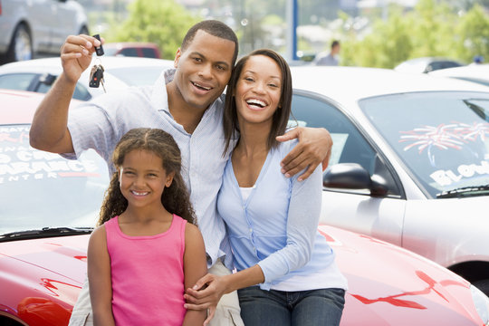 Family Collecting New Car