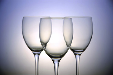 Three empty wine glasses