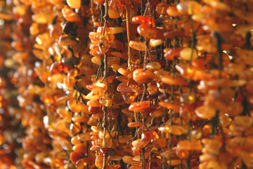 Rows of amber necklaces