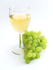 the branch of green grape isolated on the white background