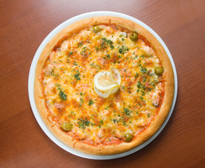 Tasty Italian pizza  with lemon