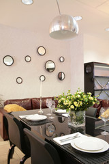 modern dinning-room  with bouquet of the roses