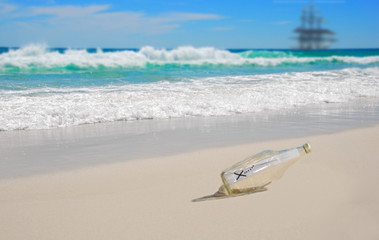Fototapeta na wymiar Message in Bottle on Beach