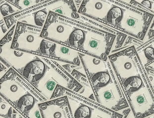 Dollar bills with serial numbers removed scattered background