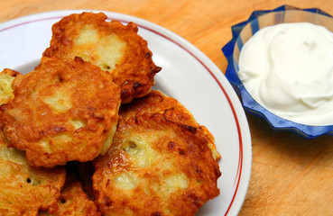 potato pancakes with sour cream