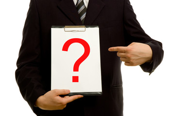 Question mark on clipboard in the hand of a businessman