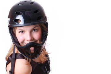 Close-up portrait of blonde girl in black helmet