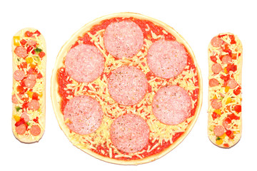 Uncooked, frozen pizza and baguettes.