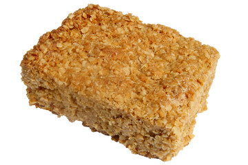 Flapjack oat cake isolated over white.