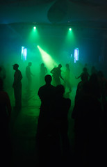 Obraz premium Dancing people in an underground club