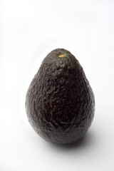 one avocado on a white background with shadow
