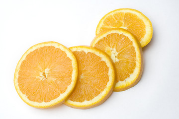 4 orange slices on a white background