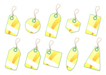 Ornamented yellow tags with copy space over white background