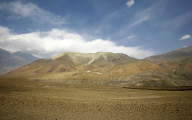 Fototapeta na wymiar blue sky and red mountain in the himalayas, annapurna, nepal