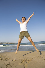 Obraz premium Jumping on the beach