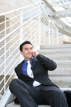 Business Man on Stairs with Phone