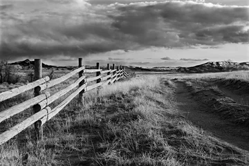 Foto op Canvas Wyoming landschap landelijke omheining in zwart-wit © Sascha Burkard