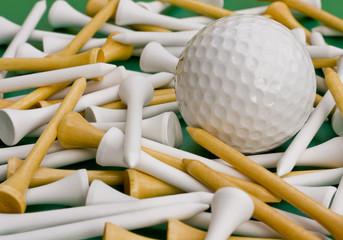 Close up of golf ball and wooden tees