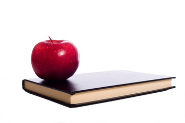 School Book and Apple