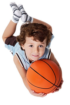 adorable child playing the basketball