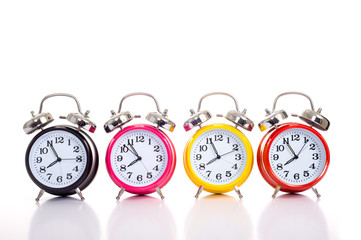 Colorful clocks in a row