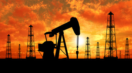 Silhouette oil rigs and pumps - 7574574