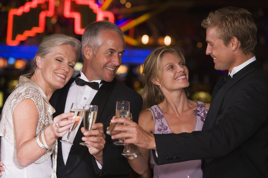 Group Of Friends Celebrating Win At Casino