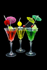 Raspberry, Pineapple & Lime cocktails on black  background