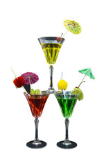 Three stacked cocktails on white background