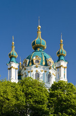 Fototapeta na wymiar Cupolas of Andreevskaya church, Kiev