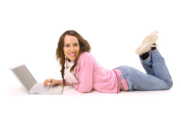 Smiley woman with notebook lying on the floor