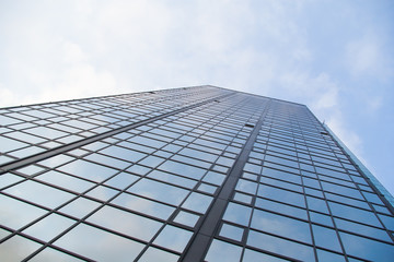 modern glass building rising to the sky