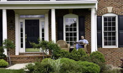 Man relaxed on porch