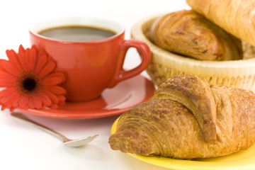 Breakfast with coffee and croissants